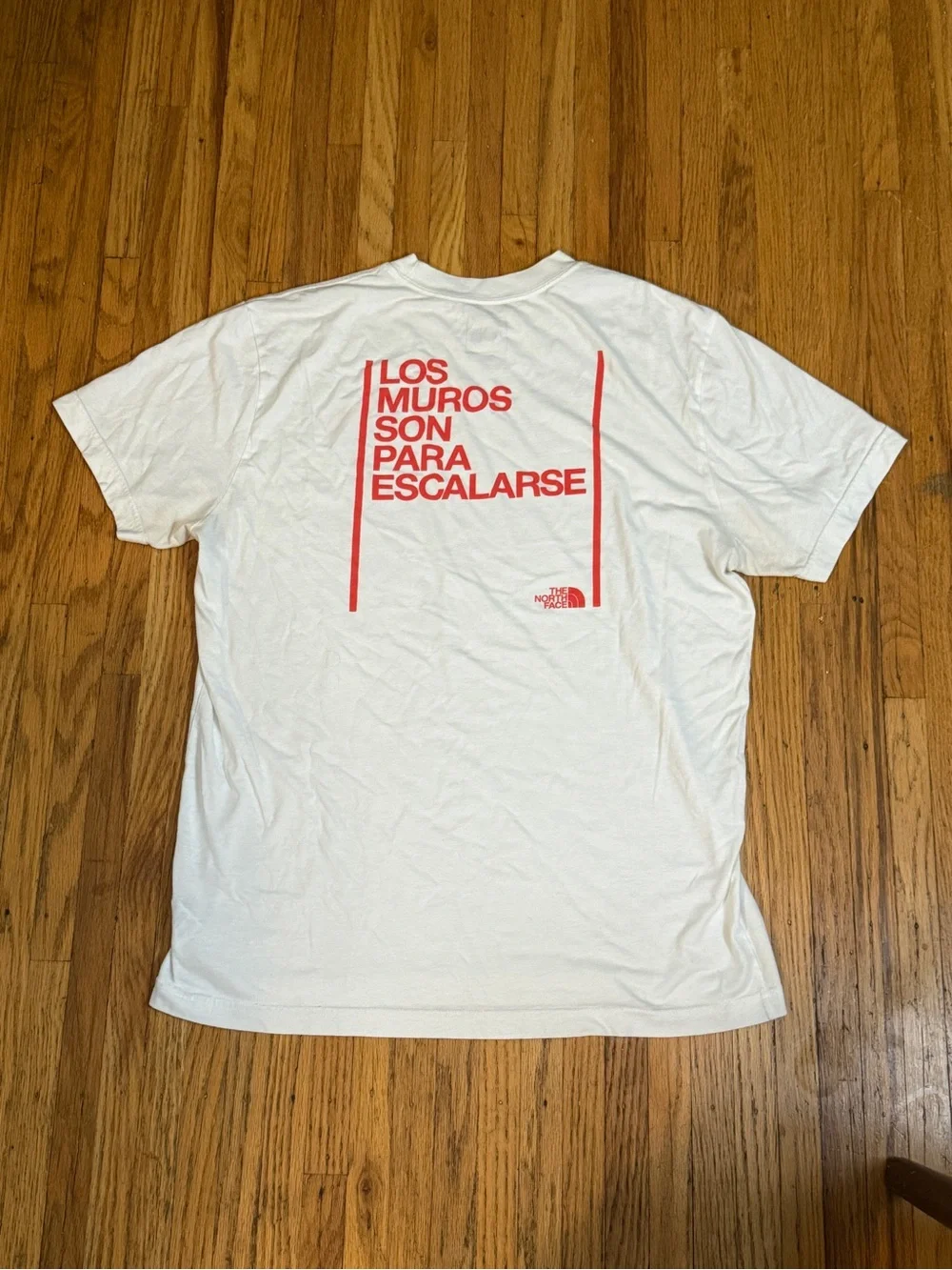 The North Face White Short Sleeve Tee with Red Logo. Size Large